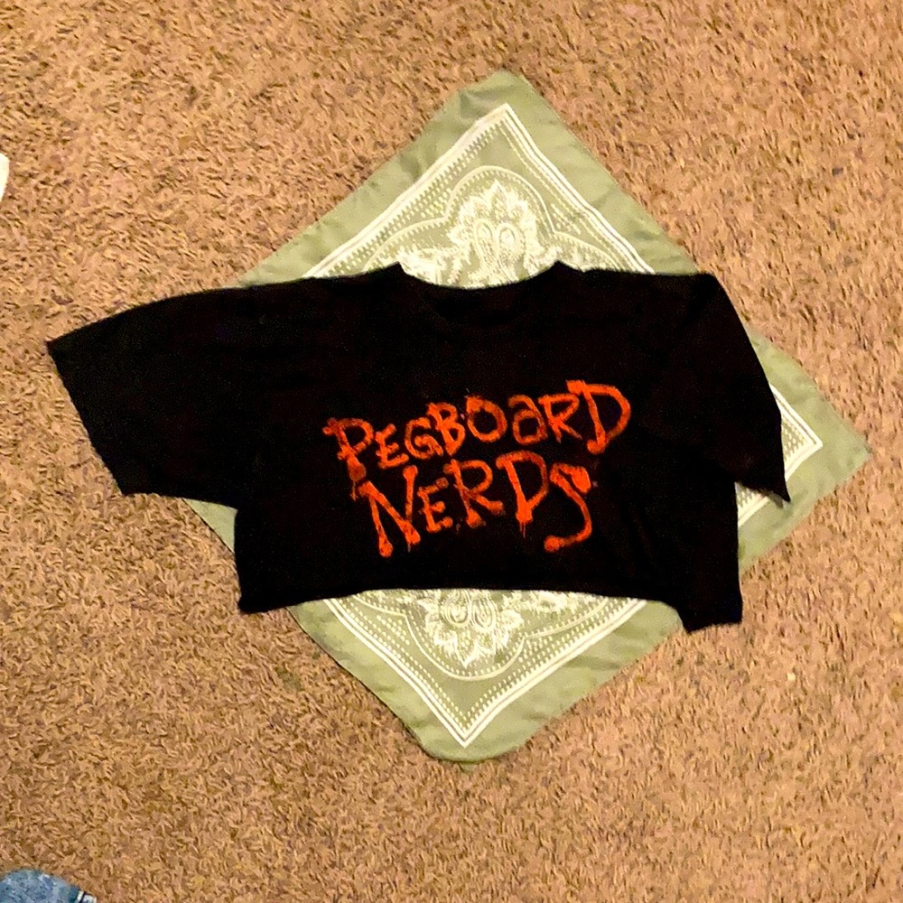 Black Croptop with red detail. Size small to medium.